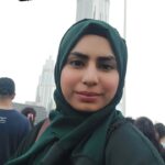 Expert Canva, Basic baking, Soup Making Tutor – MyUstaza Online Learning Platform Professional South Asian female Canva, Basic baking, Soup Making teacher wearing a hijab, smiling confidently in front of plants — expert online tutor at MyUstaza.