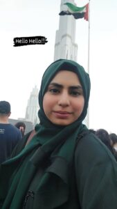 Professional South Asian female Canva, Basic baking, Soup Making teacher wearing a hijab, smiling confidently in front of plants — expert online tutor at MyUstaza.