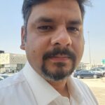 Father sharing positive feedback about his child’s learning experience on the MyUstaza online tutoring platform